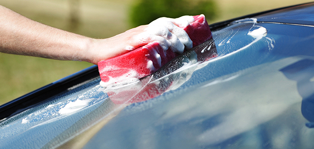 Washing Car with Sponge